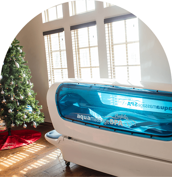Relaxing spa setup near decorated tree